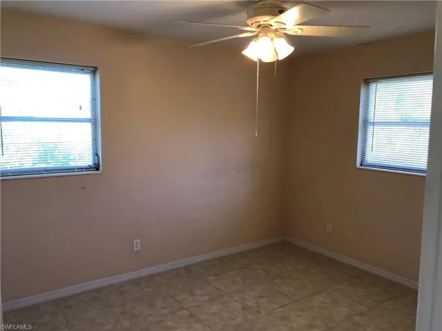 Bedroom with a healthy amount of sunlight