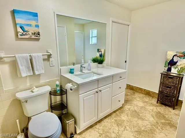 Bathroom with vanity and toilet