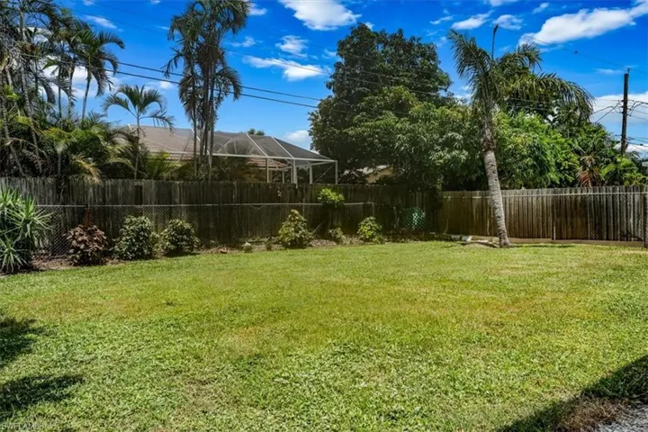 View of fenced backyard