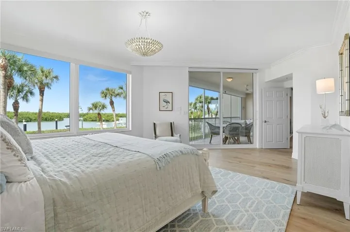 Master Bedroom with West Facing Views and Private Access to the Lanai.
