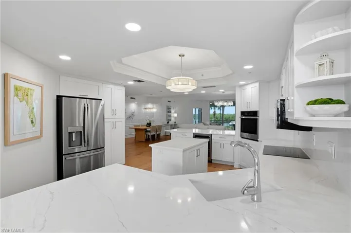 Quartz Countertops accent the beautiful kitchen.