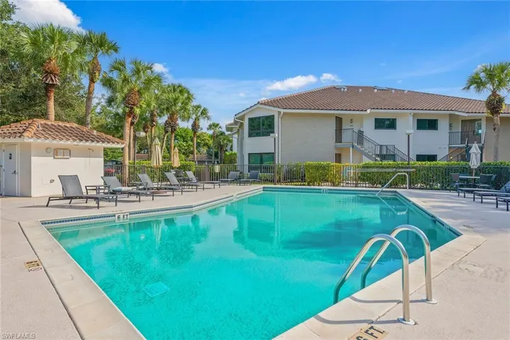 Community pool featuring a patio area