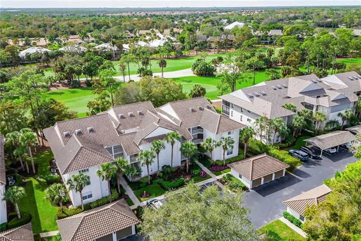 Aerial perspective of suburban area with a local golf course