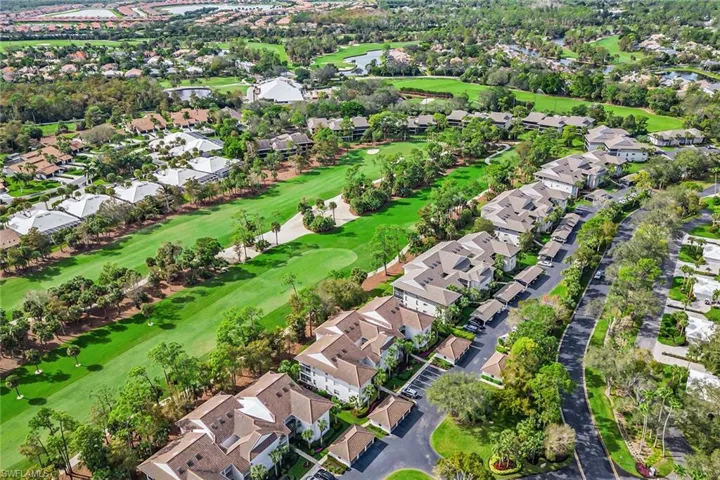 Aerial view of property's location with a golf club and nearby suburban area