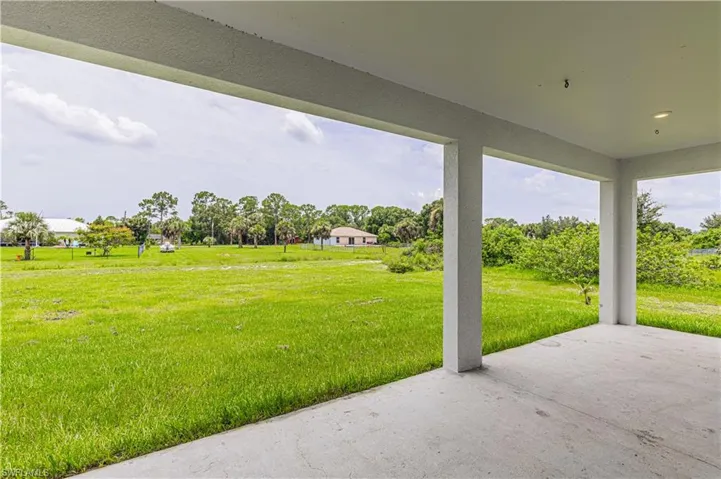 View of yard with a patio