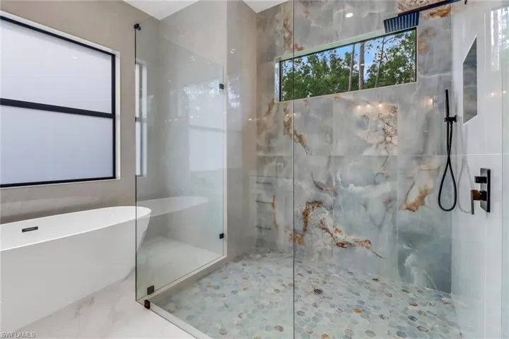 Bathroom with separate shower and tub