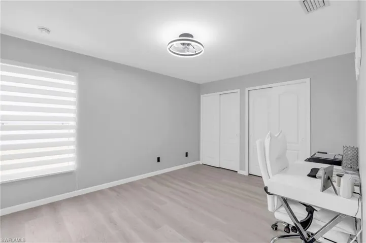 Unfurnished office featuring light hardwood / wood-style flooring