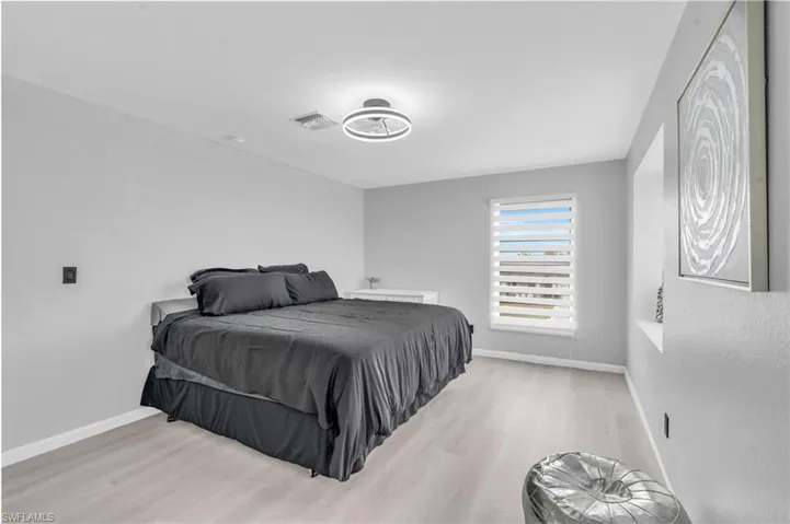 Bedroom featuring light hardwood / wood-style floors
