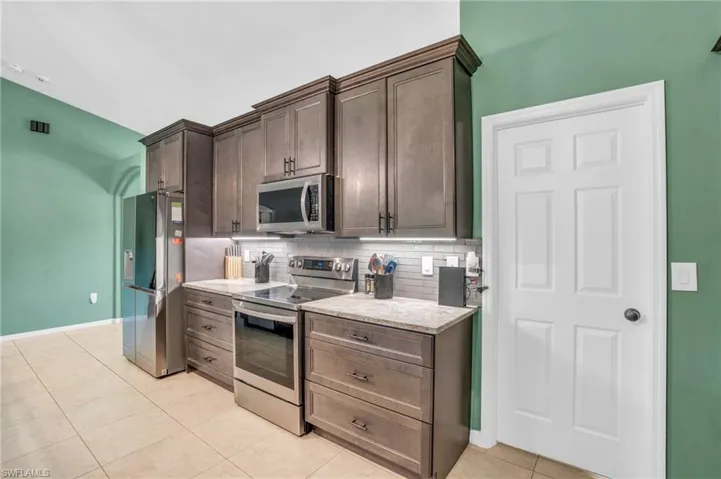 1138  Mobley E ST, Lehigh Acres, FL 33974