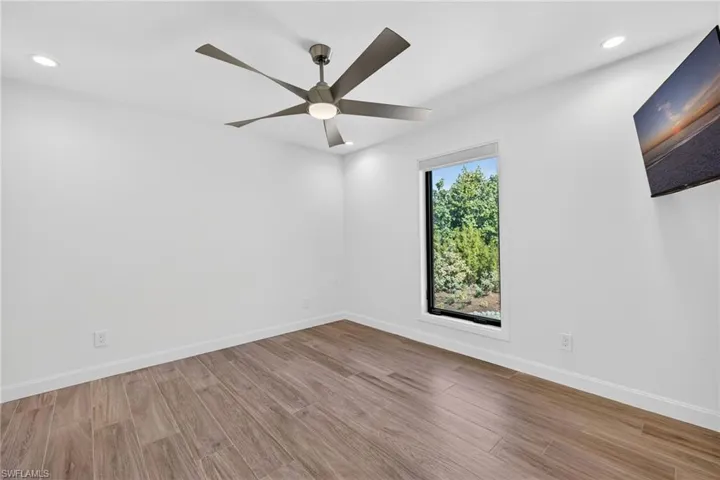 Spacious guest bedroom with double built in closets, Jack and Jill bathroom, ample natural light.