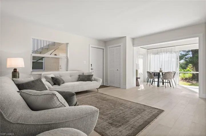 Living room featuring wood finished floors and baseboards
