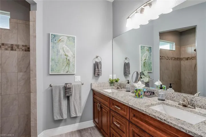 Bathroom with walk in shower and double vanity