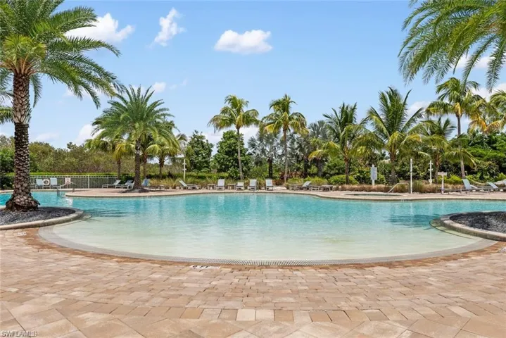 Pool featuring a patio area and fence
