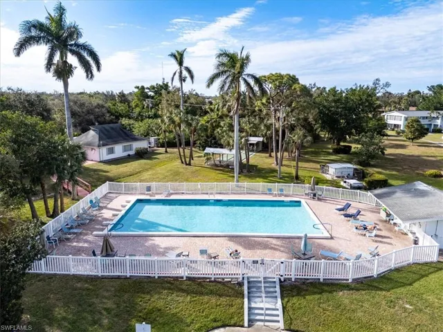 View of swimming pool featuring a lawn and a patio area