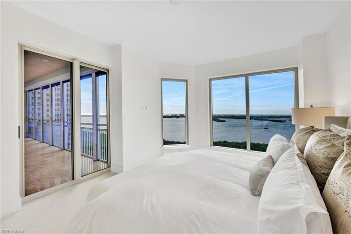 Enter the lanai from the primary suite. Wake up to the sun's reflection on the Gulf of Mexico.