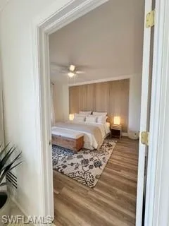 Bedroom featuring ceiling fan and light wood-type flooring