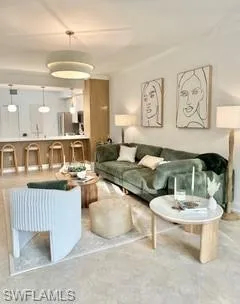 Tiled living room featuring ornamental molding