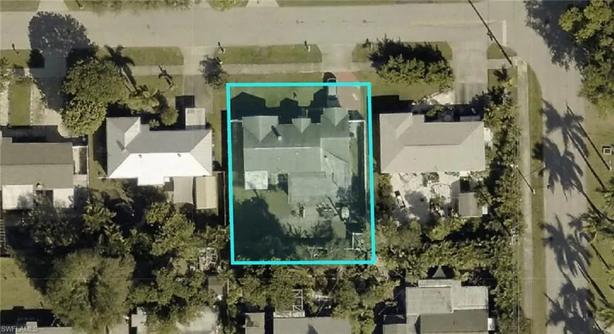 Aerial overview of property's location with property parcel outlined