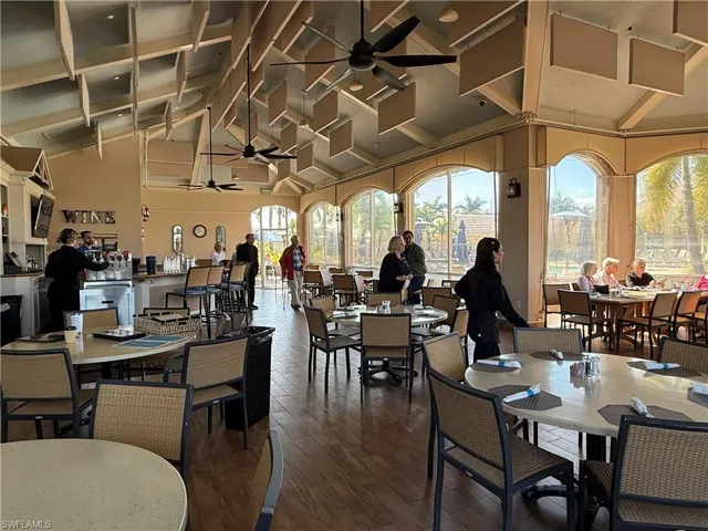 Cabana with in and out dining next to the clubhouse pool