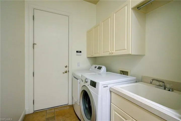 Garage door enters to laundry room