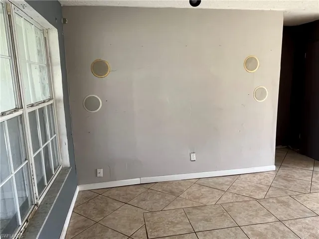 View of tiled spare room