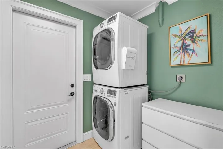 Laundry room with stacked washer / dryer