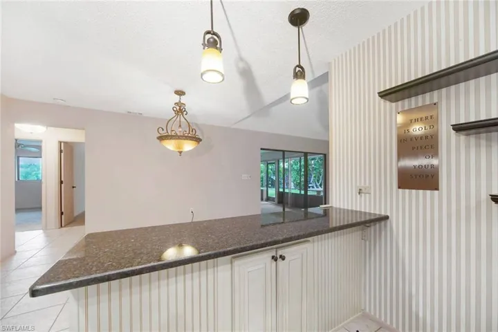 Solid surface countertops & extra storage under snack bar