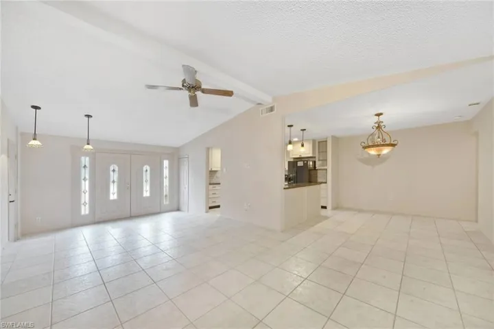 Spacious Living Room looking toward front entry
