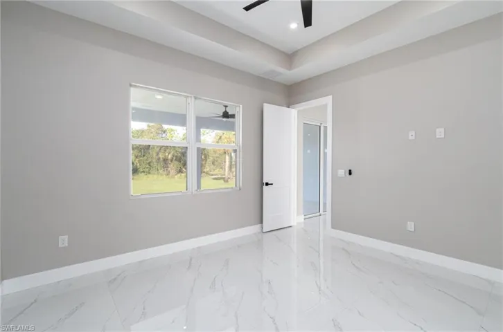 Unfurnished room featuring ceiling fan