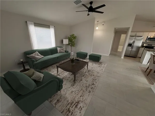 Living room with light hardwood / wood-style floors, ceiling fan, and lofted ceiling      ( Virtual Staged )