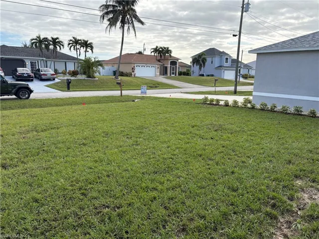 View of yard featuring a garage