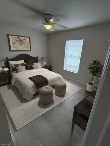 Bedroom with hardwood / wood-style floors and ceiling fan  ( Virtual Staged )