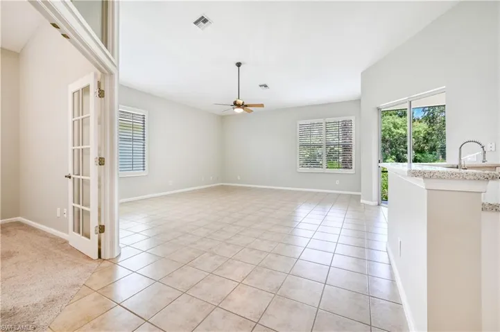 Great room with sliders to lanai.