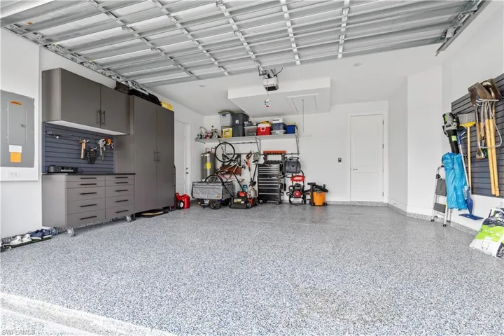 Custom Garage storage on wheels and slatwall storage.
