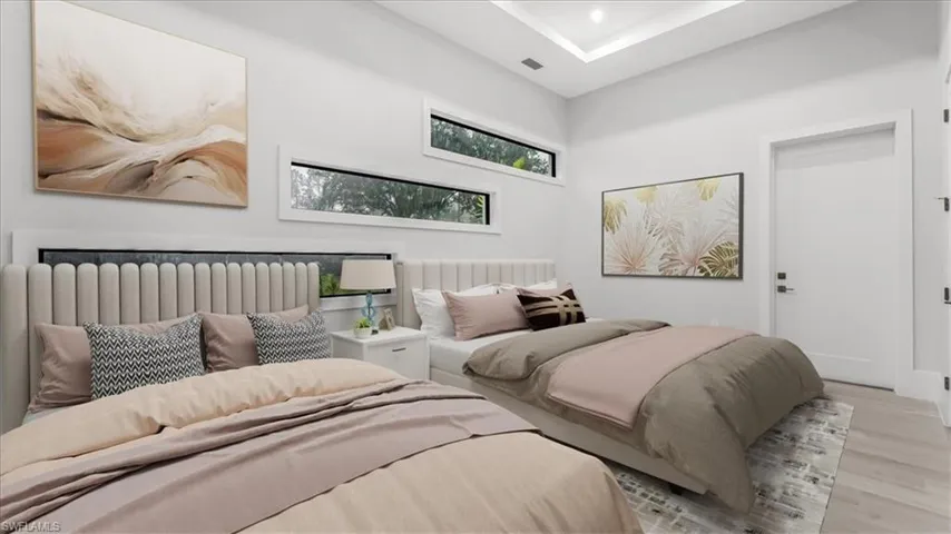 Bedroom with wood finished floors