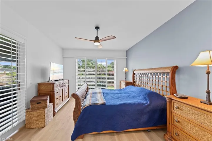Primary suite with lake and golf course views