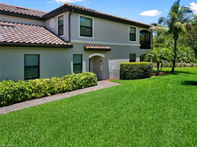 Mediterranean / spanish-style home featuring a front lawn