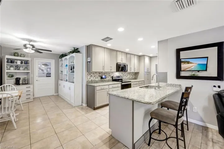 Updated Kitchen with Granite Counter tops and SS Appliance