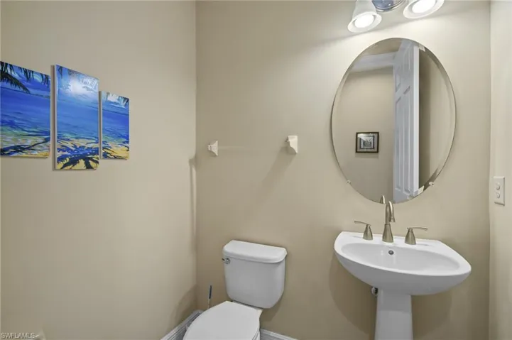 Half bathroom featuring toilet