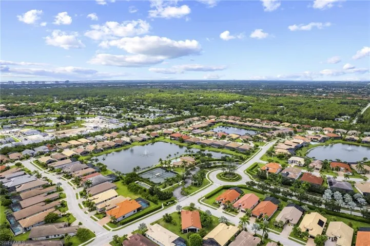 View of property location featuring nearby suburban area and a nearby body of water