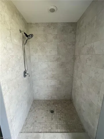 Large tiled walk-in shower in Primary Bathroom.
