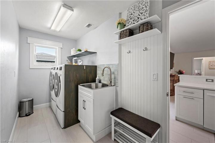 Tile Backsplash behind Sink. Garge Access