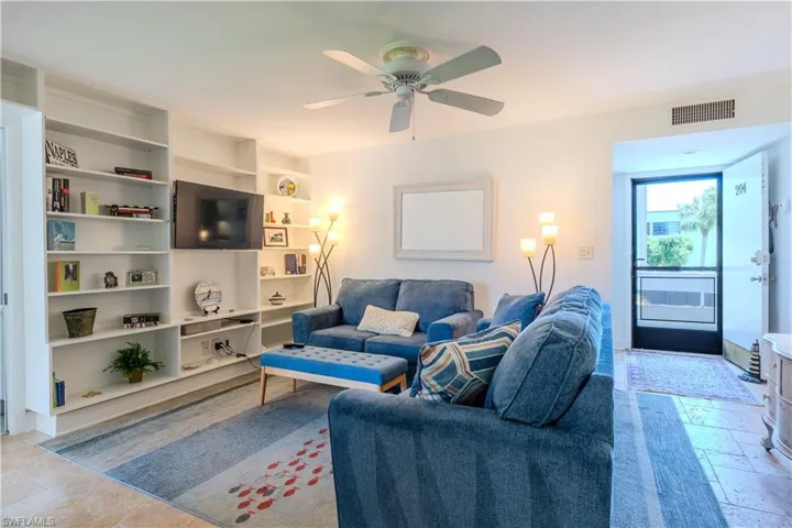 Built in bookcases, tiled floors throughout,