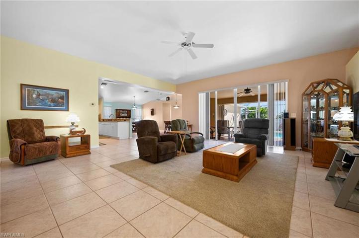 Family Room with view to Pool area and the Kitchen