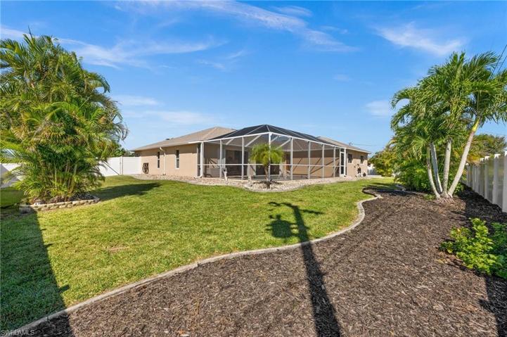 Beautifully landscaped  and fenced yard  TRIPLE LOT!!!