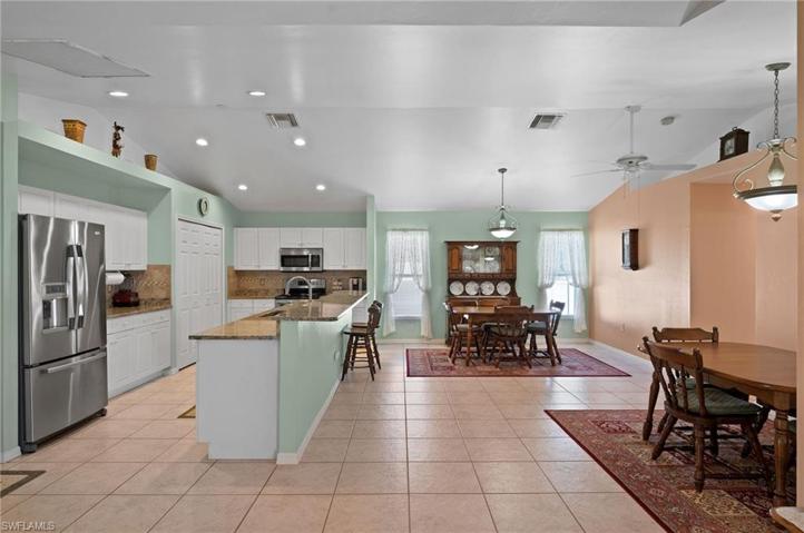View of Kitchen and dining area from Family room.