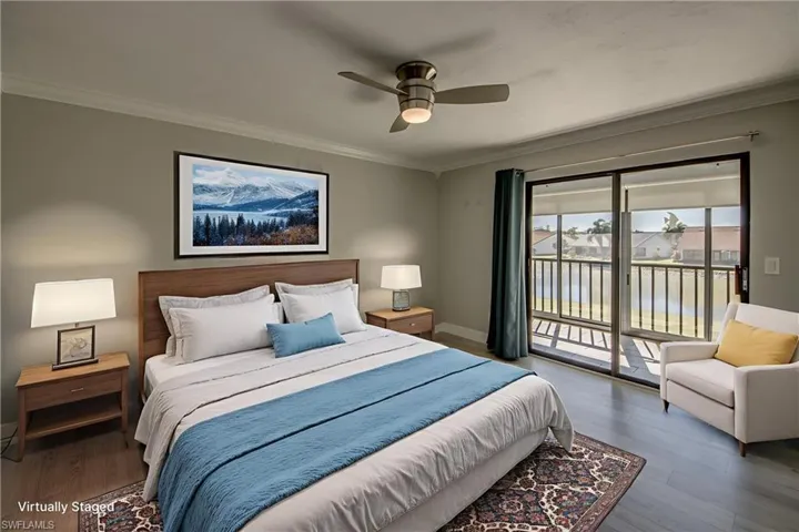 Bedroom with ornamental molding, access to outside, wood finished floors, and ceiling fan