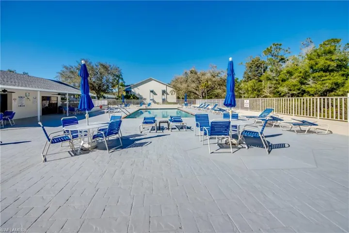 Community pool featuring a patio area
