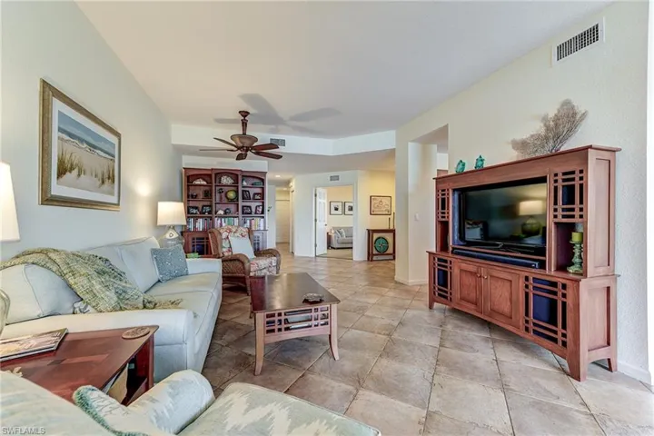 Den can be seen at center rear