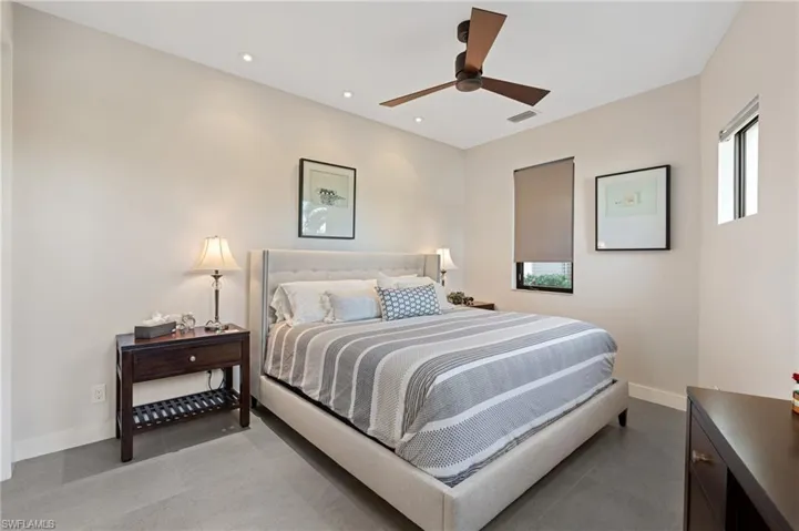 Bedroom with recessed lighting and a ceiling fan